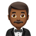 苹果系统里的穿燕尾服的人：中深色肤色emoji表情