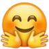 WhatsApp里的紧抱的脸emoji表情